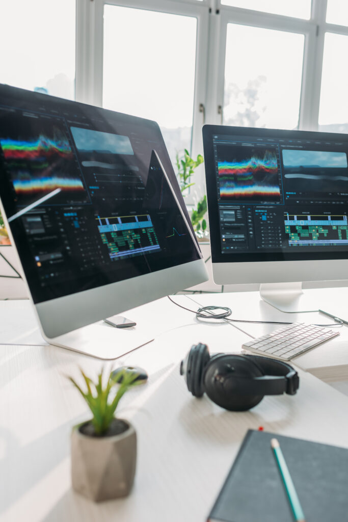 Computer monitors on a designer's desk